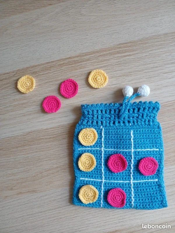 Jeu de morpion de voyage en crochet